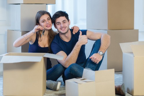 Professionals packing boxes for a move