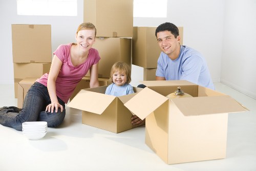 Commercial moving team handling office furniture