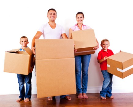 Illustration of a moving truck and packing boxes symbolizing removal services.