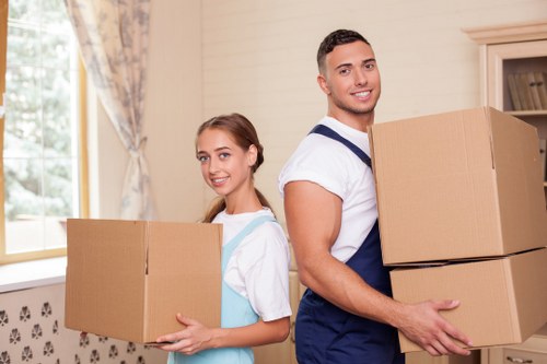 Professional movers providing a removal quote to customers