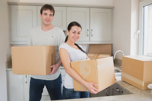 Happy family finalizing their removal quote for a move